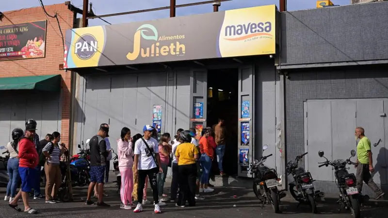 In Venezuela People queued at supermarkets and shops to stock up on food amid the uncertainty.